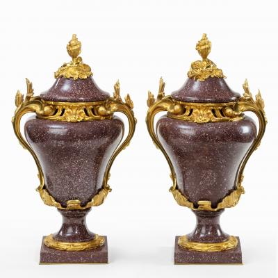 A pair Napoleon III Egyptian imperial porphyry urns and covers
