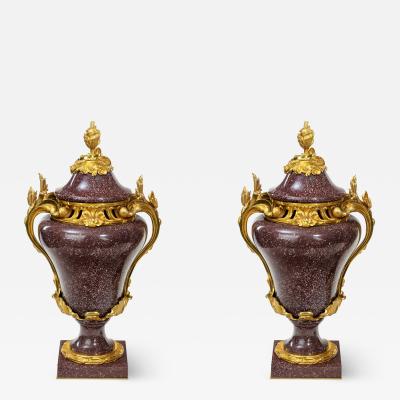 A pair Napoleon III Egyptian imperial porphyry urns and covers