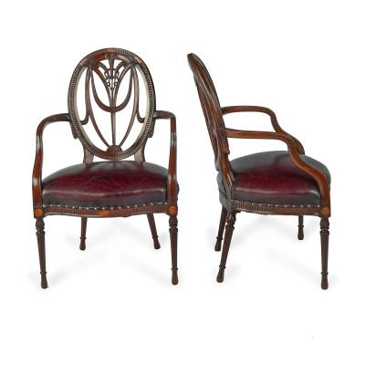 A pair mahogany Hepplewhite style arm chairs