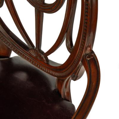 A pair mahogany Hepplewhite style arm chairs