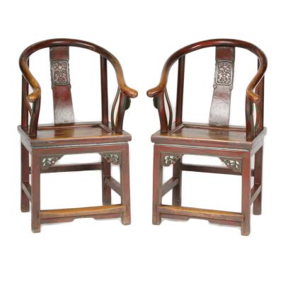 A pair of 19th Century Chinese painted horseshoe back armchairs