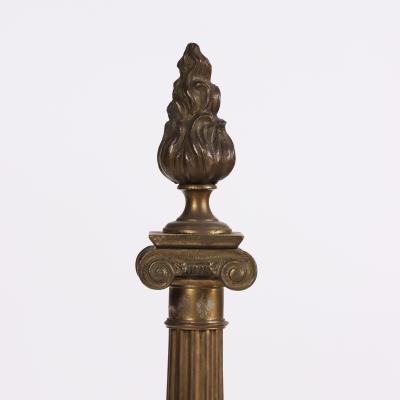 A pair of 20th Century Neoclassical Brass Andirons with Flame Finials