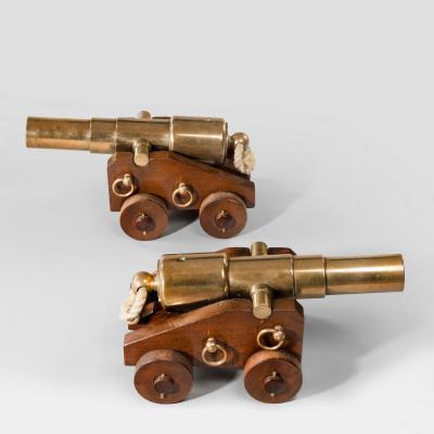 A pair of 4 stage bronze 18 signal cannon