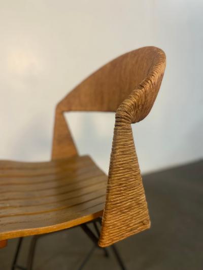 A pair of Arthur Umanoff Swiveling side chairs