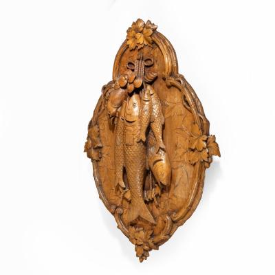 A pair of Black Forest walnut game plaques attributed to Johann Fl ck