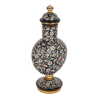 A pair of Bohemian enamelled black glass vases and covers