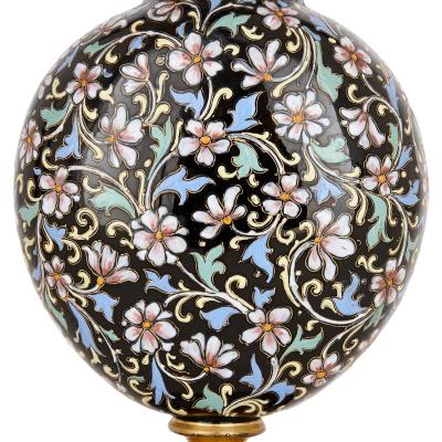 A pair of Bohemian enamelled black glass vases and covers