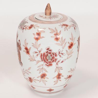 A pair of Chinese porcelain decorated jars with lids 