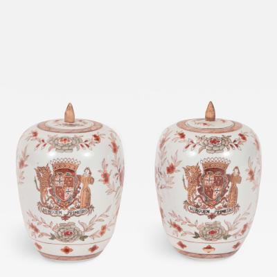 A pair of Chinese porcelain decorated jars with lids 
