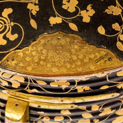 A pair of Edo period black and gold lacquer Samurai helmet boxes
