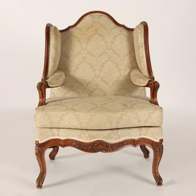 A pair of French Louis XV style carved Bergeres A oreilles C 1900 