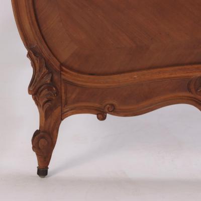 A pair of French Louis XV style walnut twin beds C 1900 