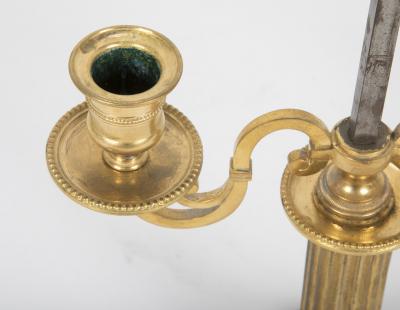 A pair of French Louis XVI Bouilliotte lamps