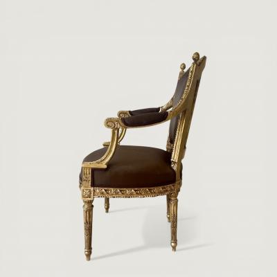 A pair of French Louis XVI Carved Giltwood fauteuils late 18th century Stamped