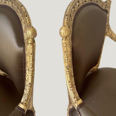 A pair of French Louis XVI Carved Giltwood fauteuils late 18th century Stamped