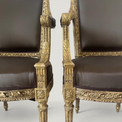 A pair of French Louis XVI Carved Giltwood fauteuils late 18th century Stamped