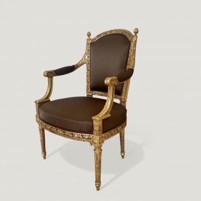 A pair of French Louis XVI Carved Giltwood fauteuils late 18th century Stamped