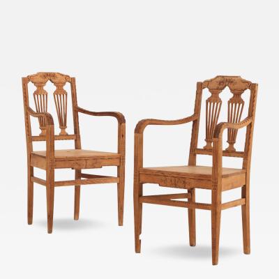 A pair of French Louis XVI style carved bleached oak armchairs C 1890 