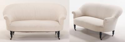 A pair of French Napoleon III sofas with continuous backs circa 1860 