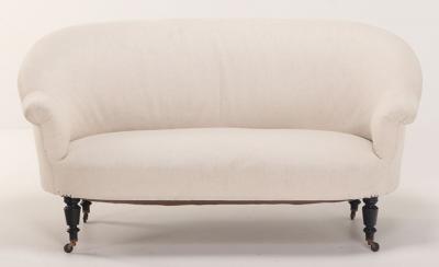 A pair of French Napoleon III sofas with continuous backs circa 1860 