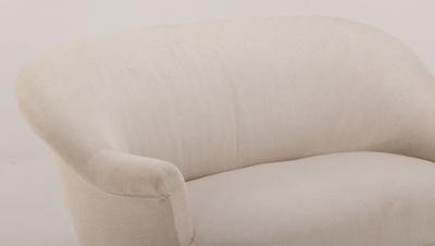 A pair of French Napoleon III sofas with continuous backs circa 1860 
