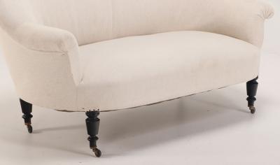 A pair of French Napoleon III sofas with continuous backs circa 1860 