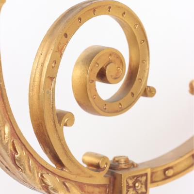 A pair of French Neoclassical style gilt bronze sconces having classical masks 