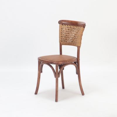 A pair of French Vintage oak side chairs with rattan backs and seats
