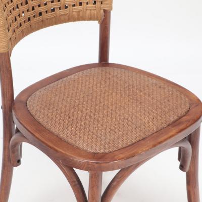 A pair of French Vintage oak side chairs with rattan backs and seats