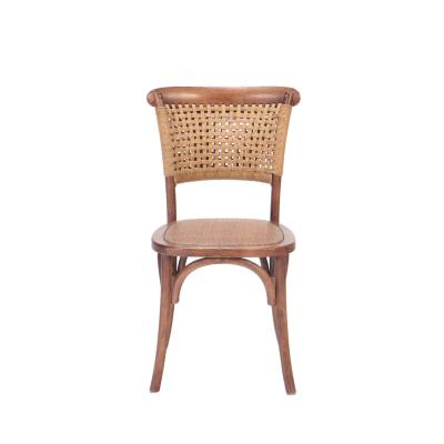 A pair of French Vintage oak side chairs with rattan backs and seats