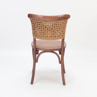 A pair of French Vintage oak side chairs with rattan backs and seats