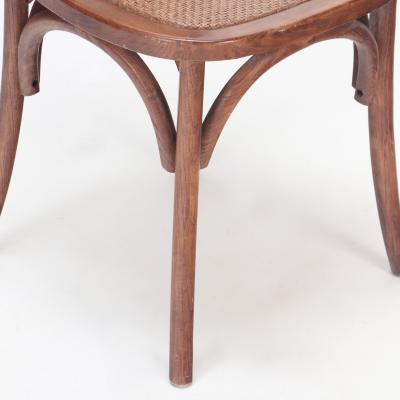 A pair of French Vintage oak side chairs with rattan backs and seats
