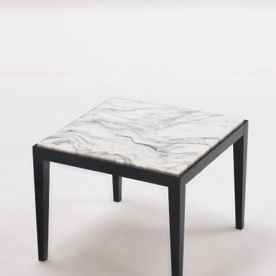 A pair of French ebonized square end tables C 1960 