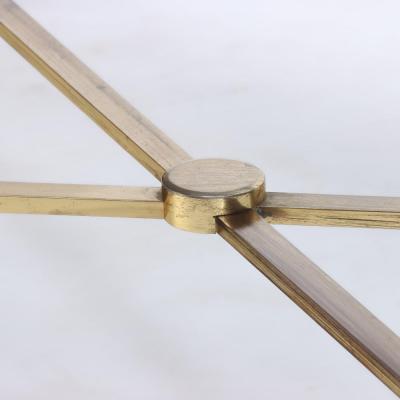 A pair of French two tone bronze coffee tables attributed to Jansen C 1970