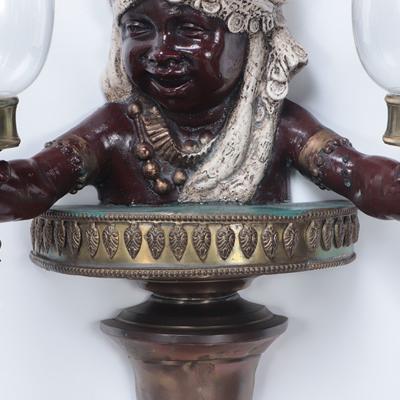 A pair of French vintage patinated brass figural wall sconces 19th C