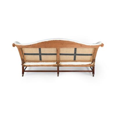 A pair of Georgian mahogany sofas from Powderham Castle sofas settees