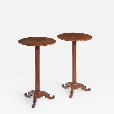 A pair of Italian solid olive wood side tables