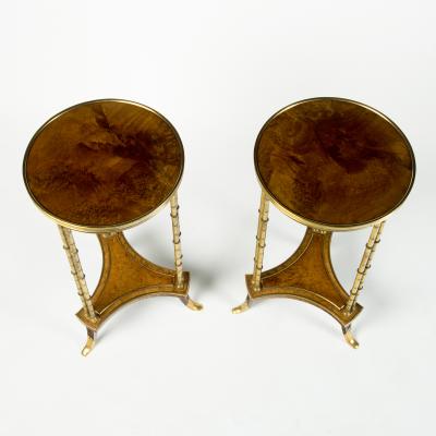 A pair of Louis XVI style mahogany and ormolu gueridons after Adam Weisweiler