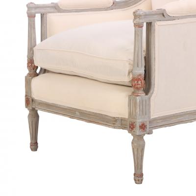 A pair of Louis XVI style partial gilt wood upholstered Berg re chairs C 1940 