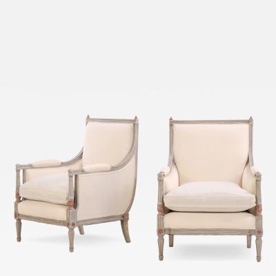 A pair of Louis XVI style partial gilt wood upholstered Berg re chairs C 1940 