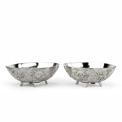 A pair of Meiji period solid silver bowls by Eigyoku