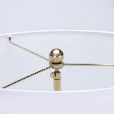 A pair of Mid Century Harlequin table lamps by Gerald Thurston Circa 1950 