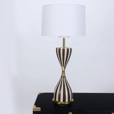 A pair of Mid Century Harlequin table lamps by Gerald Thurston Circa 1950 