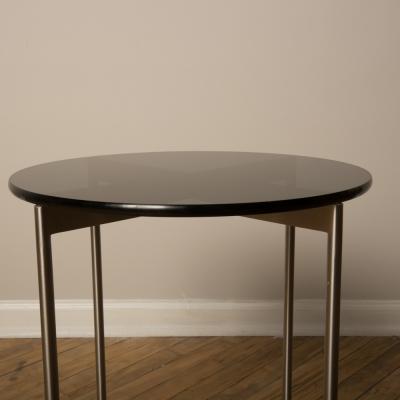 A pair of Mid Century chrome and glass round side table 1950s