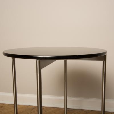 A pair of Mid Century chrome and glass round side table 1950s