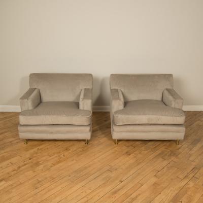 A pair of Mid Century oversized Italian club chairs with bronze legs C 1950