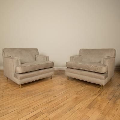 A pair of Mid Century oversized Italian club chairs with bronze legs C 1950
