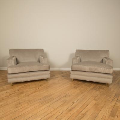 A pair of Mid Century oversized Italian club chairs with bronze legs C 1950
