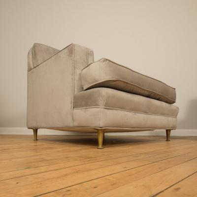 A pair of Mid Century oversized Italian club chairs with bronze legs C 1950