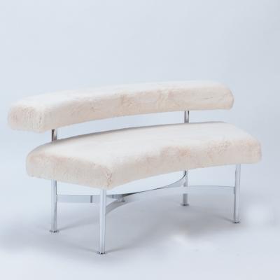 A pair of Modern curved shaped chrome benches or small sofas circa 1970 